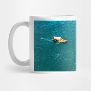 Top view on fishing boat in turquoise Mediterranean sea Mug